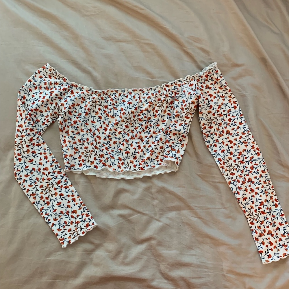 white flower off the shoulder shirt